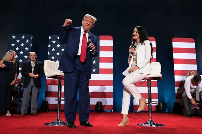 Republican presidential nominee Donald Trump takes the stage to the chant of "Fight, fight, fight" during a town hall-style campaign event moderated by Rep. Anna Paulina Luna (R-Fla.) at the Crown Center Arena in Fayetteville, N.C., on Oct. 4, 2024. Photo by Win McNamee/Getty Images.