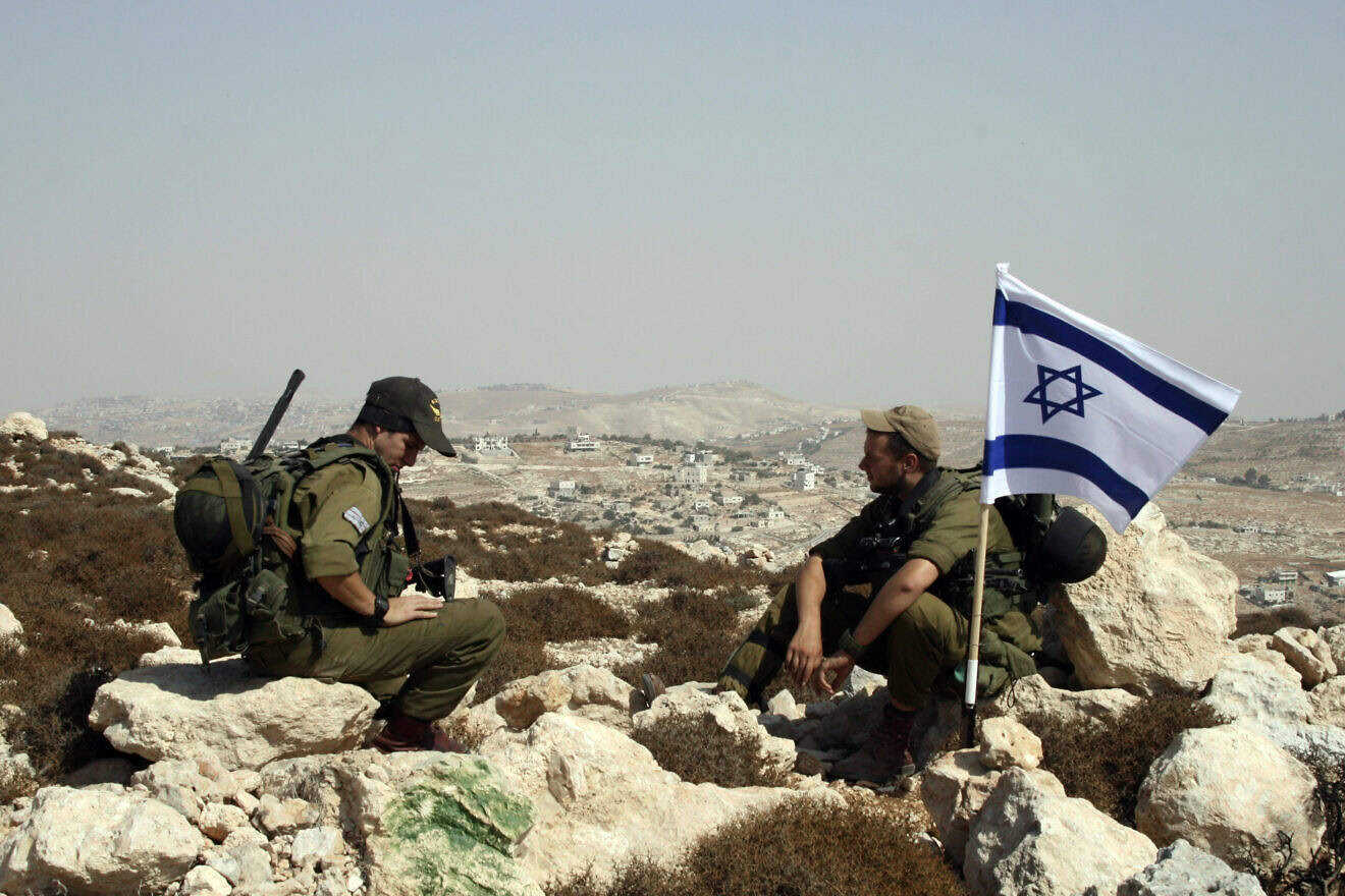 Israel security personnel near Eitam Farm in the Gush Etzion region of Judea, Oct. 11, 2009. Photo by Gershon Elinson/Flash90.