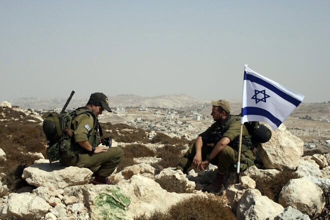 Israel security personnel near Eitam Farm in the Gush Etzion region of Judea, Oct. 11, 2009. Photo by Gershon Elinson/Flash90.
