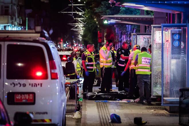 Israeli security and rescue personnel at the scene of a terrorist shooting attack in Jaffa, Oct. 1, 2024. Credit: Flash90.