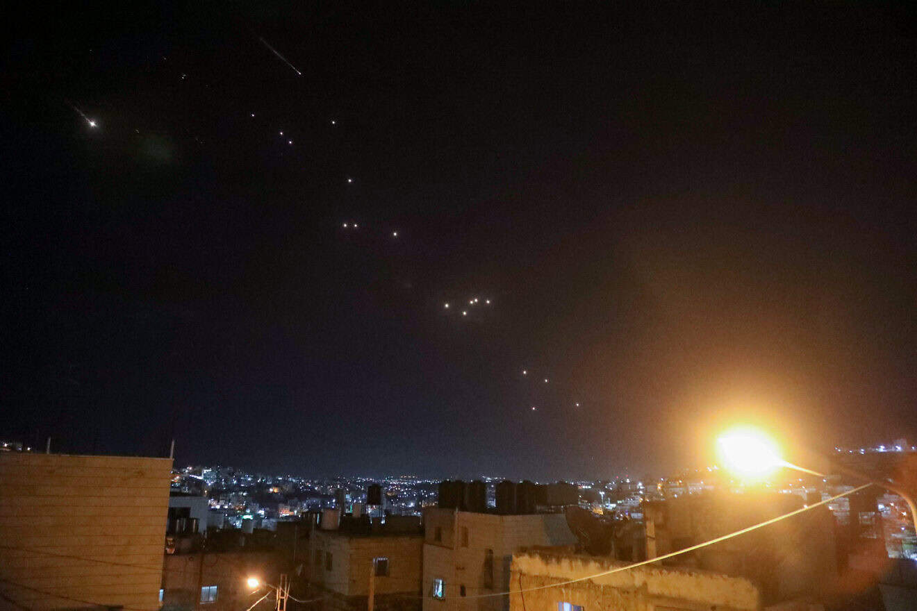 An Israeli defense system fires interceptors at missiles launched from Iran, Oct. 1, 2024. Photo by Wisam Hashlamoun/Flash90.
