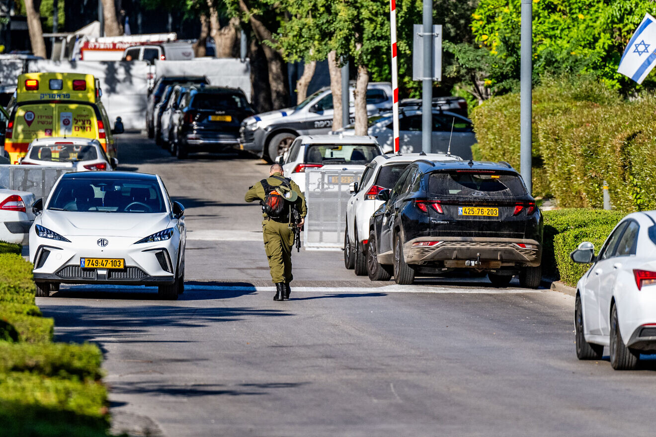Israeli security forces at the scene where a drone fired from Lebanon caused damage in Caesarea, Oct. 19, 2024. Photo by Flash90.