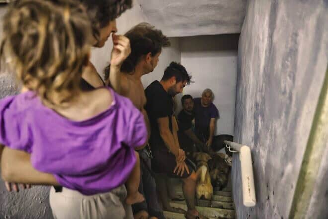 Israelis take cover as air-raid sirens are activated in Tel Aviv, Oct. 23, 2024. Photo by Yehoshua Yosef/Flash90.
