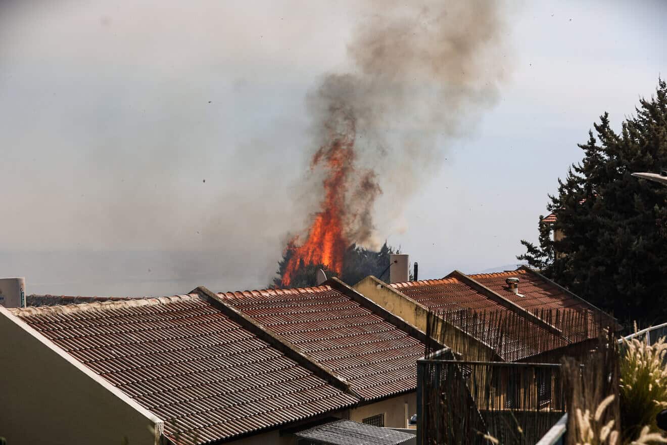 A fire that broke out the northern Israeli city of Safed as a result of missiles fired by Hezbollah in Lebanon, Oct. 20, 2024. Photo by David Cohen/Flash90.