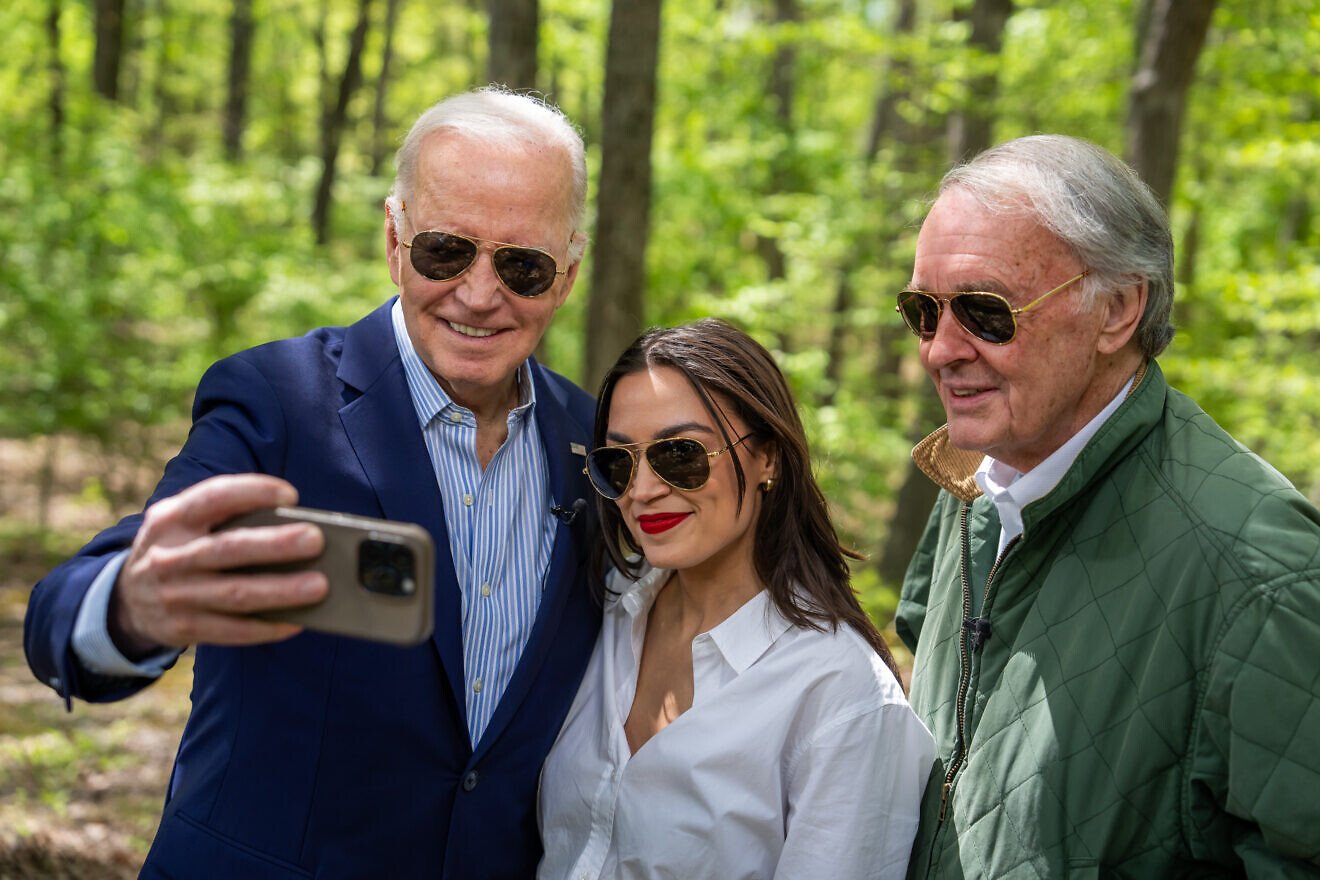 U.S. President Joe Biden, Alexandria Ocasio-Cortez (D-NY.) and Sen. 
Ed Markey (D-Mass.) record a video message before an Earth Day event at Prince William Forest Park, April 22, 2024, in Triangle, Va. Credit: Adam Schultz/White House.