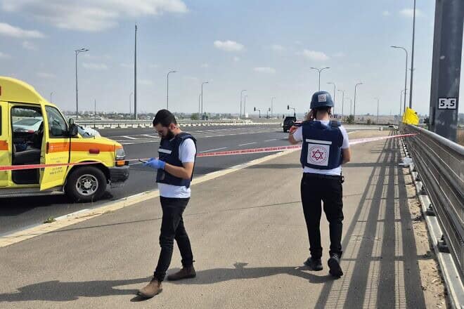 Magen David Adom medics and paramedics at the scene of a shooting on Highway 4 near Yavne in central Israel on Oct. 15, 2024. Credit: MDA.