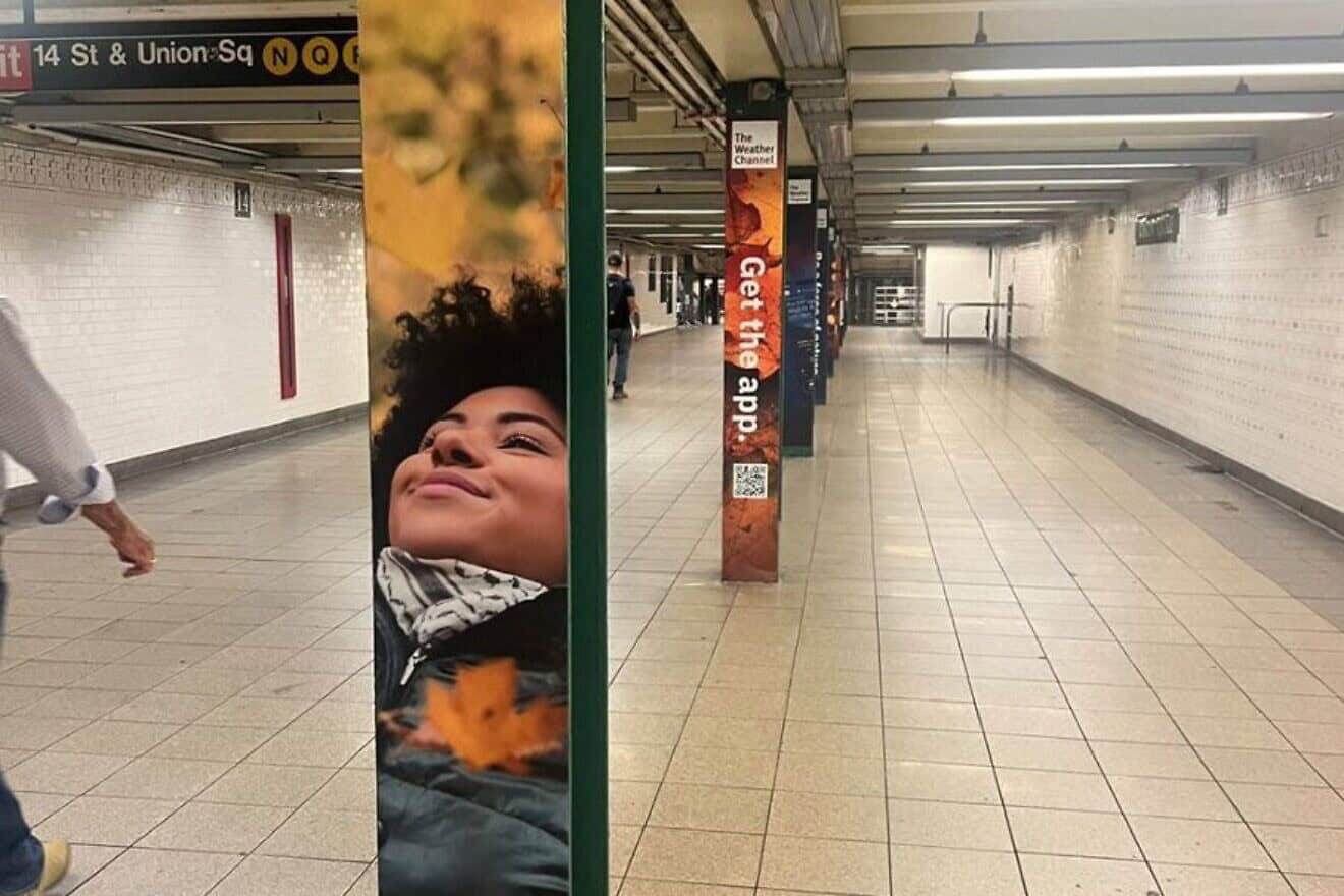 A "Weather Channel" ad in a New York City subway station, Oct. 10, 2024. Credit: StopAntisemitism.