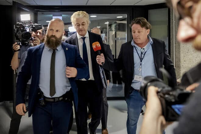 Dutch Party For Freedom (PVV) party leader Geert Wilders (C) leaves after attending formation talks between the PVV, VVD, NSC and BBB factions in The Hague on May 15, 2024. Photo by Sem van der Wal/ANP/AFP via Getty Images.