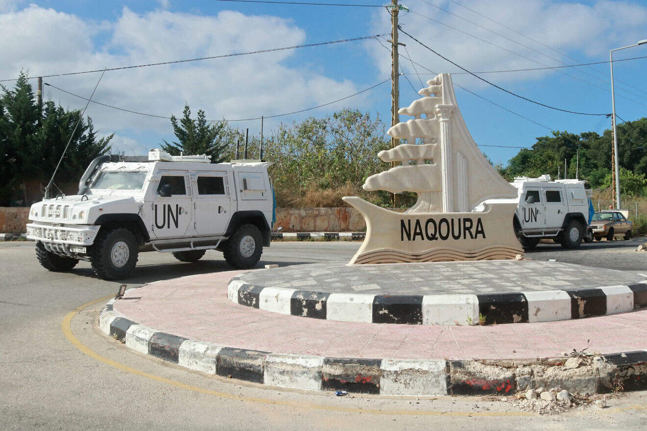 Armored vehicles of the United Nations Interim Force (UNIFIL) in Lebanon patrol on the entrance of the Southern Lebanese town of Naqoura near the border with Israel on June 17, 2024. Photo by Mahmoud Zayyat/AFP via Getty Images.