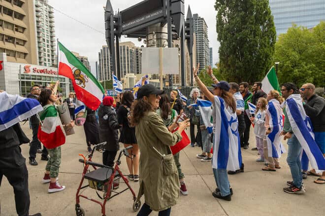 A group of Iranian-Canadians gathers in Toronto to celebrate the reported death of Hezbollah leader Hassan Nasrallah, Sept. 28, 2024. Photo by Pouria Afkhami/Middle East Images/AFP via Getty Images.