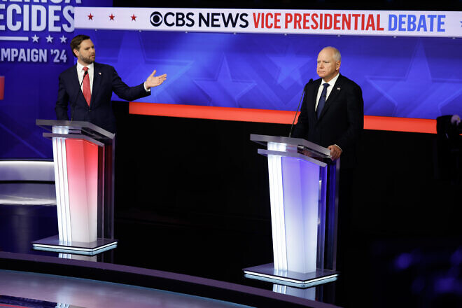 Republican vice-presidential candidate, Sen. JD Vance (R-Ohio), and Democratic vice presidential candidate, Minnesota Gov. Tim Walz, participate in a debate at the CBS Broadcast Center in New York City Oct. 1, 2024. Photo by Chip Somodevilla/Getty Images.