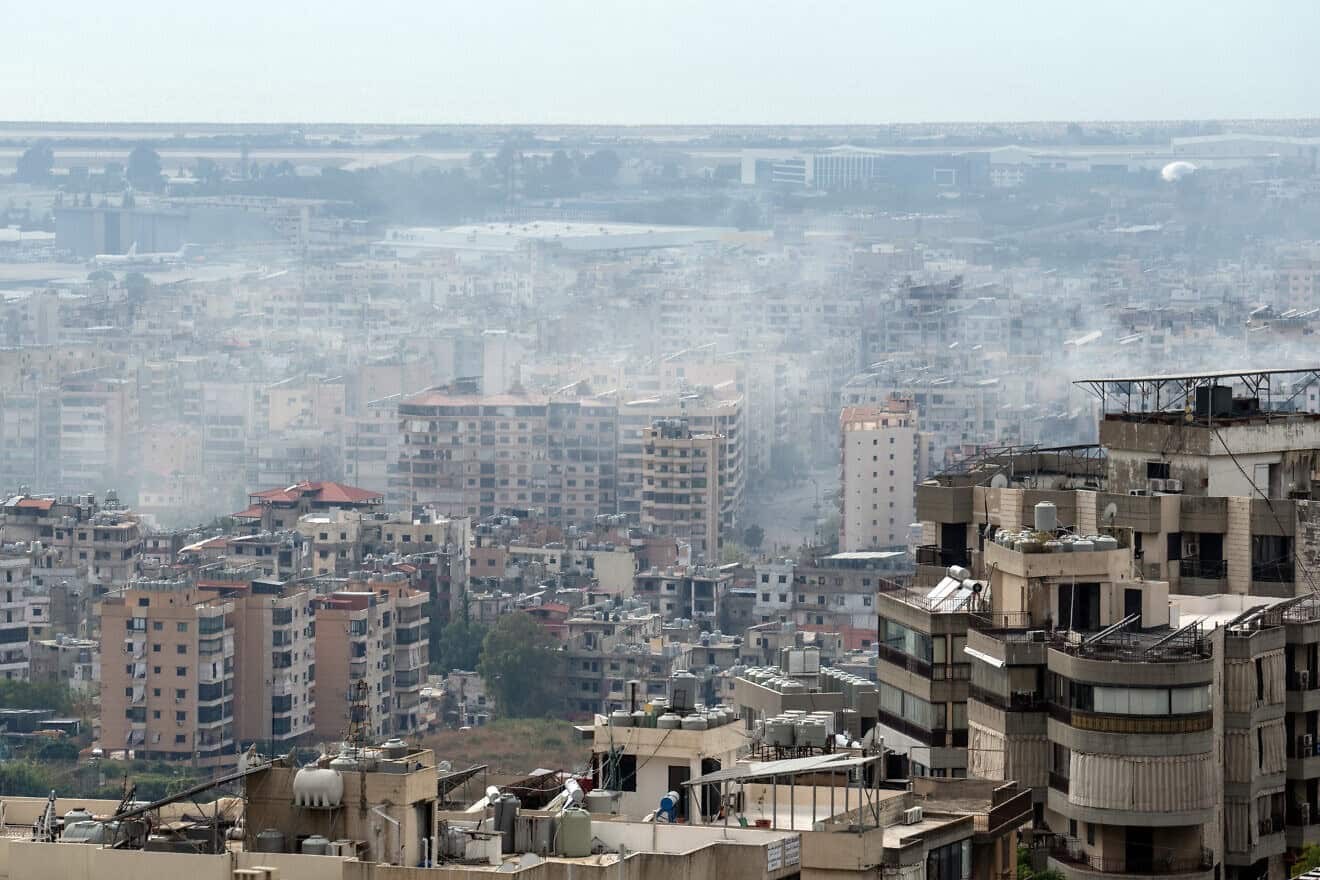 Smoke rises in the Hezbollah terrorist stronghold of Dahiyeh following Israeli airstrikes, Oct. 6, 2024. Photo by Carl Court/Getty Images.
