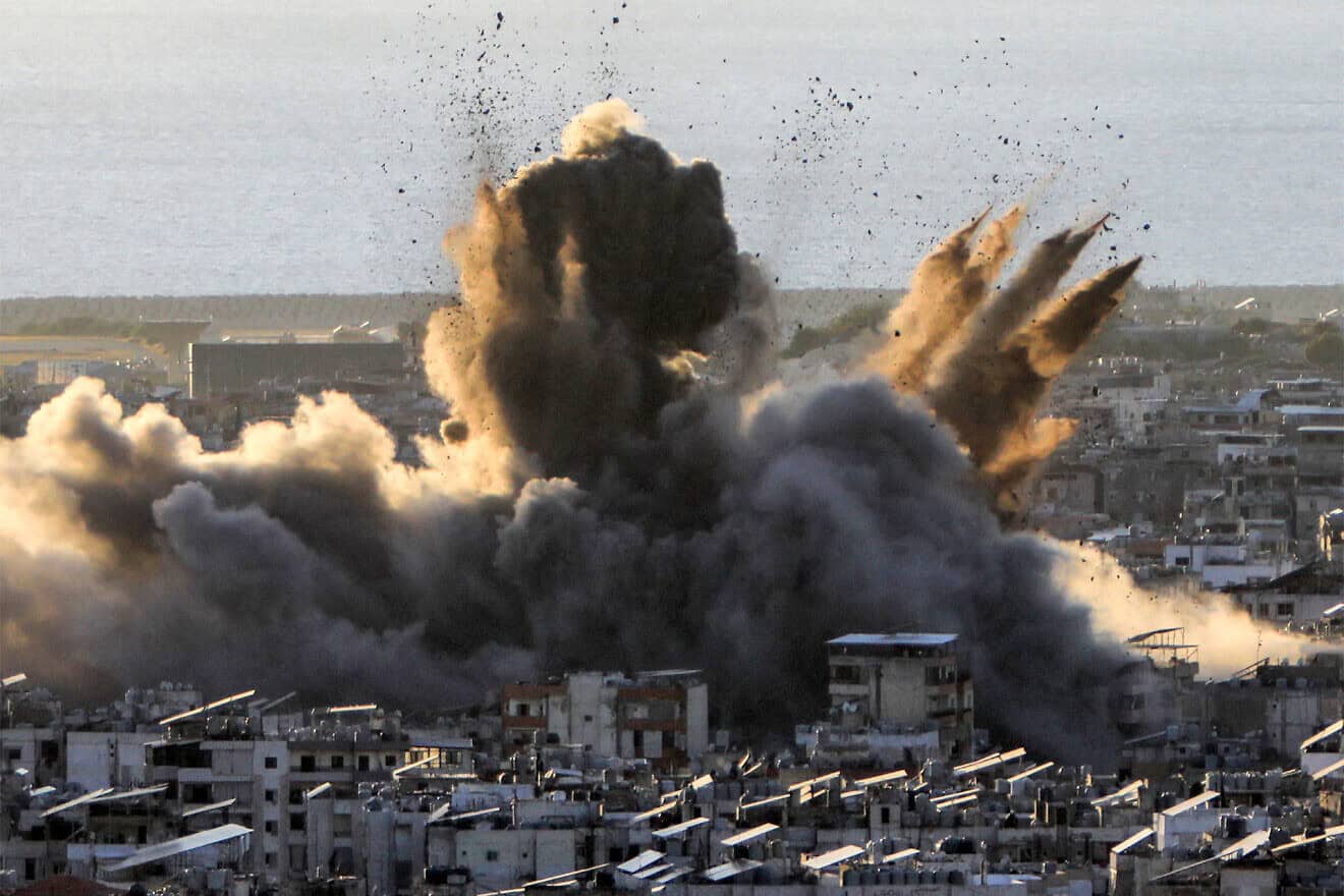 A cloud of smoke erupts following an Israeli airstrike on Beirut's southern suburbs on Oct. 19, 2024. Photo by AFP via Getty Images.