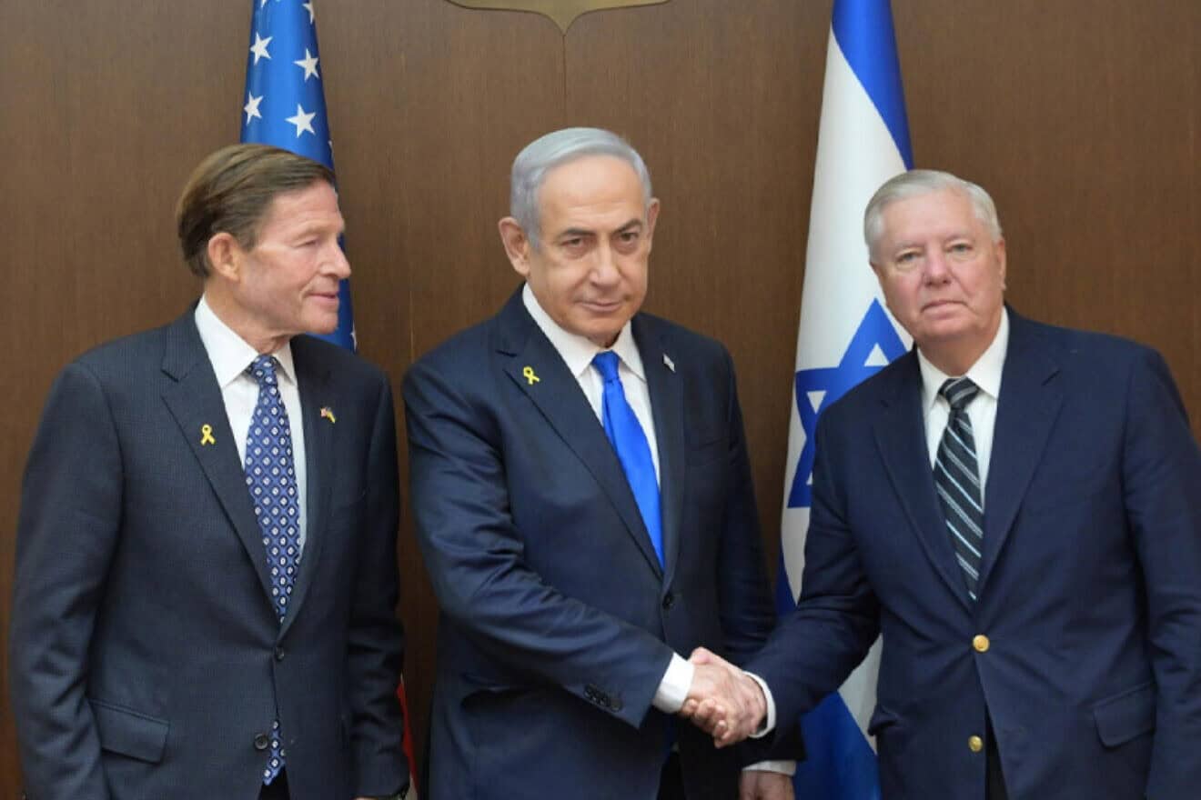 Israeli Prime Minister Benjamin Netanyahu flanked by Democratic Senator Richard Blumenthal (left) and Republican Senator Lindsey Graham, Jerusalem, Oct. 7, 2024. Credit: GPO/Amos Ben Gershom.