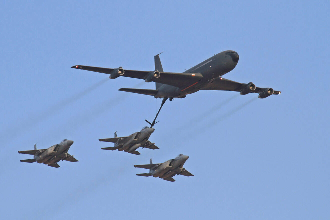 An Israeli Air Force Boeing 707 tanker aircraft fuels an IAF F-15 fighter jet, June 28 2011. Photo by Ofer Zidon/Flash90.