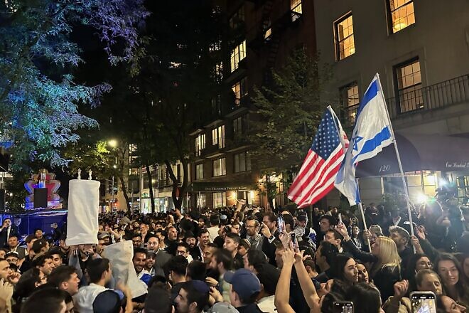 An estimated 5,000 people gathered on Manhattan's Upper East Side on Oct. 7, 2024 to celebrate a new Torah scroll dedicated in honor of the victims of Hamas's terror attack the prior year. Credit: Hallie Geller/Chabad Young Professionals Upper East Side.