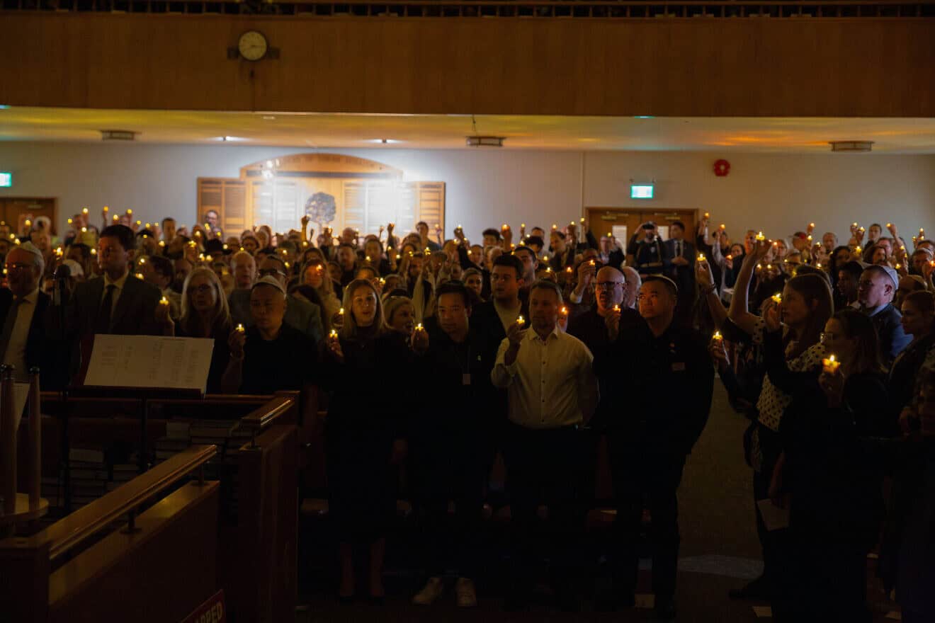 Jewish community members in Vancouver, Canada, commemorate the lives lost in southern Israel on Oct. 7, 2023, when Hamas terrorists infiltrated the border and murdered 1,200 people and kidnapped 251 others, at a candlelit vigil on Oct. 7, 2024. Credit: Jewish Federation of Greater Vancouver in British Columbia, Canada.