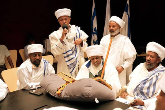 Liqa Kahenat Chief Kes Berko Tegegne reads from The Orit at the National Library of Israel in Jerusalem. Photo by Michael Zekri.