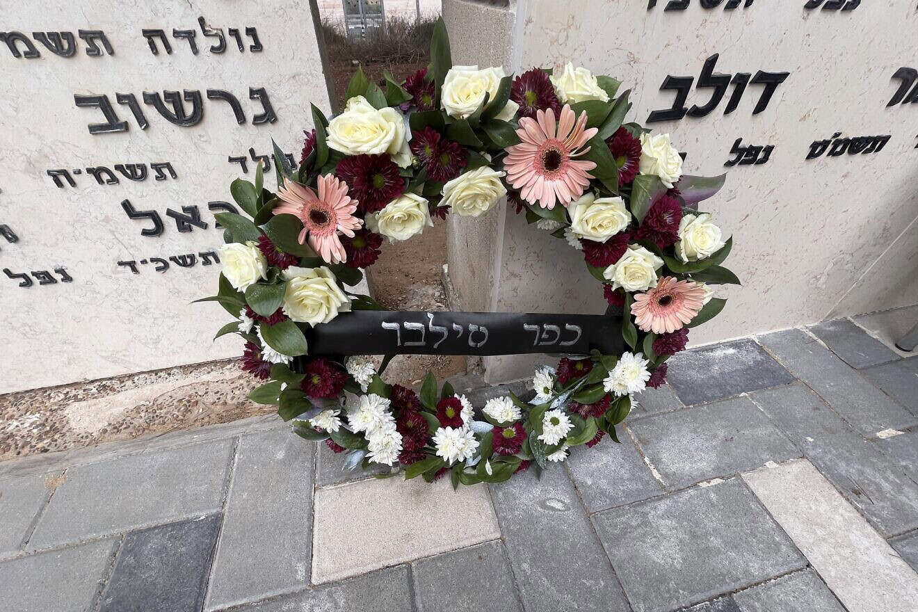 A wreath to honor nine fallen graduates of the Kfar Silver Youth Village near Ashkelon, Israel, on Oct. 7, 2024. Credit: ORT America.