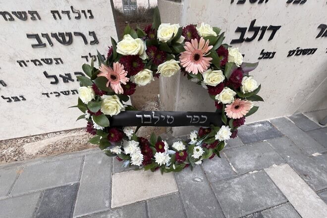 A wreath to honor nine fallen graduates of the Kfar Silver Youth Village near Ashkelon, Israel, on Oct. 7, 2024. Credit: ORT America.