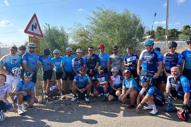 Riders at the memorial set up for Tomer Shpirer near Tzomet Mefalsim, Oct. 5. 2024. Photo: Amelie Botbol.