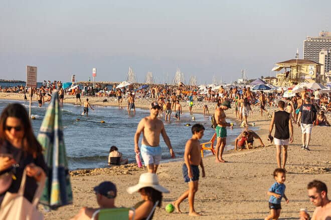 Israelis enjoy the beach in Tel Aviv on Sept. 28, 2024. Photo by Itai Ron/Flash90.