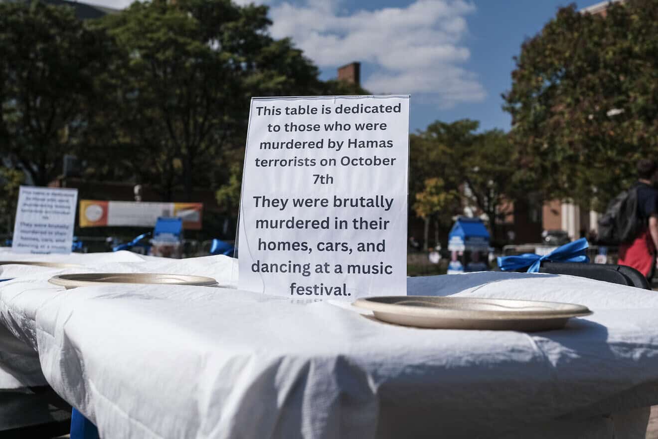 A Shabbat table sits   is Hornbake Plaza on the campus of the University of Maryland in College Park, Md., on Oct. 7, 2024. Michael A. McCoy for “The Washington Post” via Getty Images.