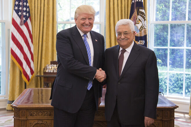 President Donald Trump and Palestinian Authority leader Mahmoud Abbas shake hands as they meet, May 3, 2017, in the Oval Office of the White House in Washington, D.C. Credit: Shealah Craighead/White House.