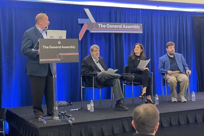 (Seated, from left) The Democrat strategist and pollster Mark Mellman, "Newsweek" opinion editor Batya Ungar-Sargon (moderator) and Republican pollster Frank Luntz at the Jewish Federations of North America's General Assembly in Washington, D.C., Nov. 11, 2024. Photo by Mike Wagenheim.