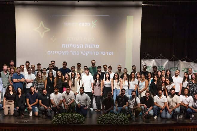 Afeka College of Engineering scholarship recipients gather at a special ceremony held in honor of former students and alumni who were either murdered on Oct. 7 or fell in battle during the Swords of Iron War. Photo by Nimrod Aronov.