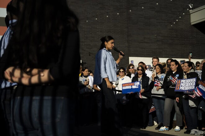 Rep. Alexandria Ocasio-Cortez (D-N.Y.) speaks at a “Vota con Orgullo” (“Get out the Vote”) block party in Philadelphia on Nov. 3, 2024. Photo by Joe Lamberti for “The Washington Post” via Getty Images.