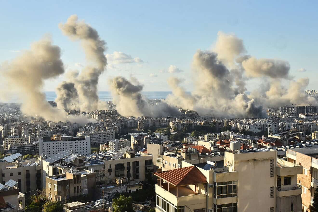 Smoke billows above Beirut's southern suburbs following an Israeli airstrike on Nov. 26, 2024. Photo by Fadel Itani/AFP via Getty Images.
