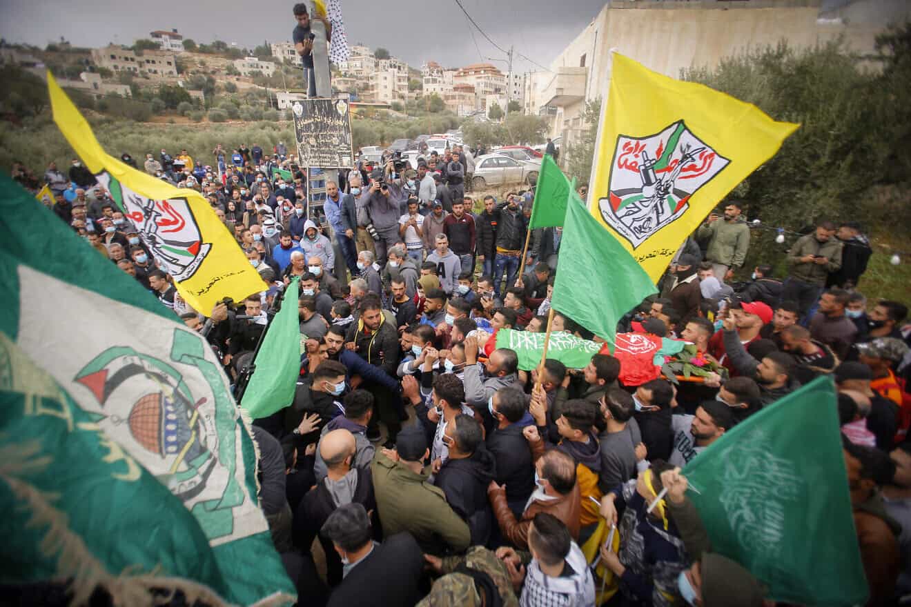 Palestinian terrorists at a funeral in Al-Mughayyir, near Ramallah in Samaria, Dec. 5, 2020. Photo by Nasser Ishtayeh/Flash90