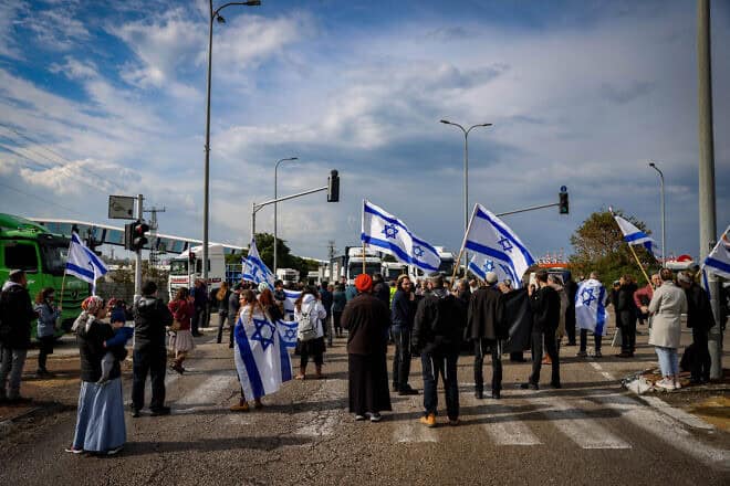 Tzav 9 activists block the entrance to Ashdod Port during a protest against aid trucks entering the Gaza Strip, Feb. 1, 2024. Photo by Chaim Goldberg/Flash90.