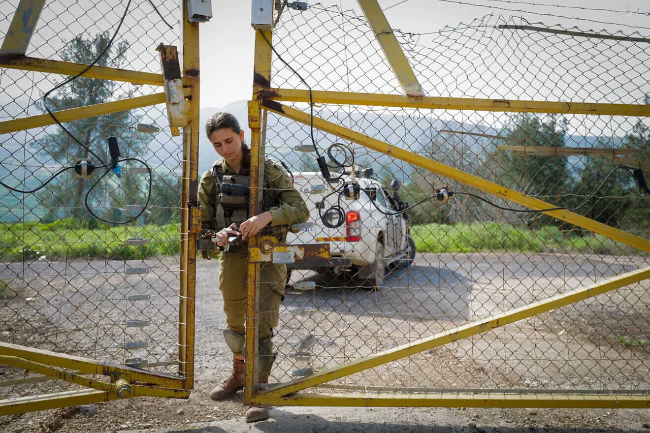 An Israeli soldier at the border fence on the tripoint frontier between Israel, Syria and Jordan, Feb. 15, 2024. Photo by Michael Giladi/Flash90.