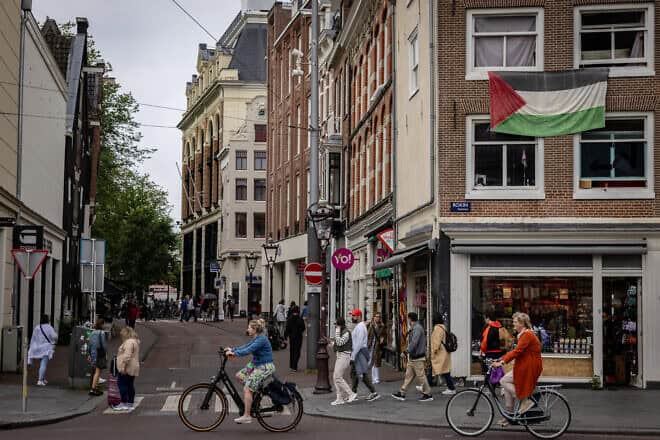 A Palestinian flag hangs on a building in Amsterdam. June 20, 2024. Photo by Chaim Goldberg/Flash90.