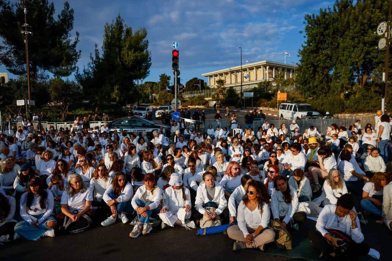 Supporters of Israelis held hostage in the Gaza Strip dress in white as they attend a silent protest outside the Knesset in Jerusalem calling for their release, Nov. 4, 2024. Photo by Chaim Goldberg/Flash90.