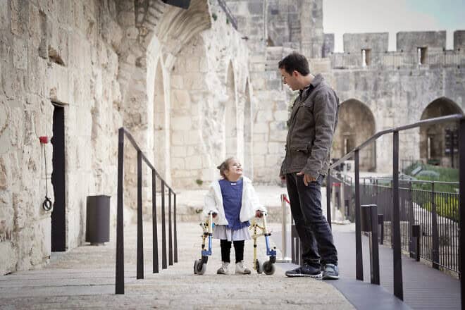 Geffen Kan-Tor, 5, exploring David's Citadel in the Old City of Jerusalem with her father. Photo by Ricky Rachman.