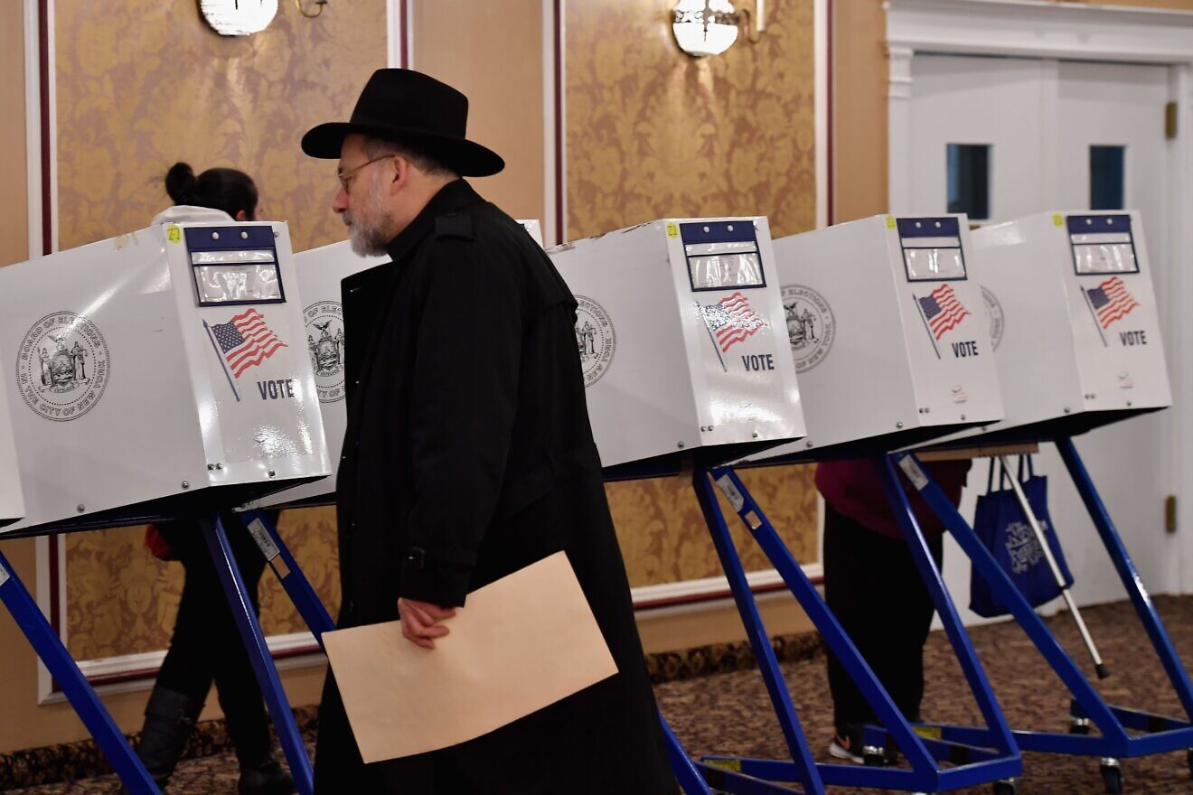 A voter of the Jewish community casts his ballots in the midterm election at the East Midwood Jewish Center polling station in the Brooklyn borough of New York City on Nov. 6, 2018. Photo by Angela Weiss/AFP via Getty Images.