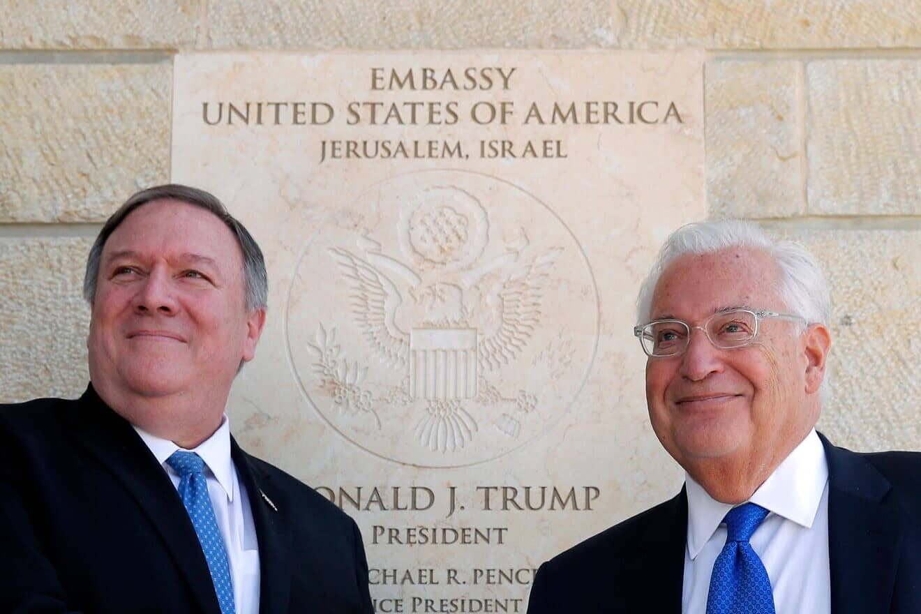 U.S. Secretary of State Mike Pompeo (L) and U.S. ambassador to Israel David Friedman stand next to the dedication plaque at the U.S. embassy in Jerusalem on March 21, 2019. Photo by Jim Young/AFP via Getty Images.