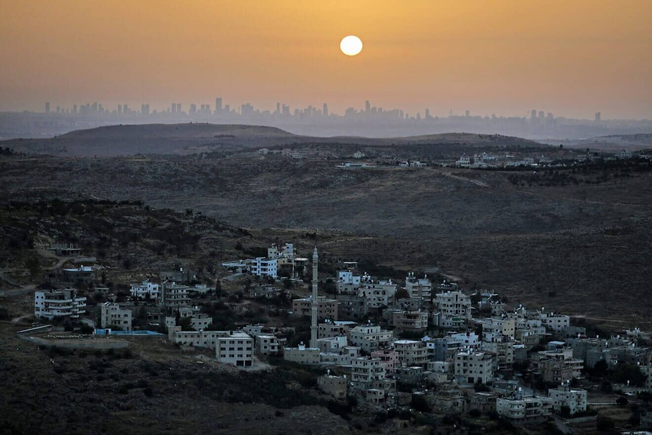 The Tel Aviv skyline as seen from western Samaria, June 17, 2020. Photo by Menahem Kahana/AFP via Getty Images.