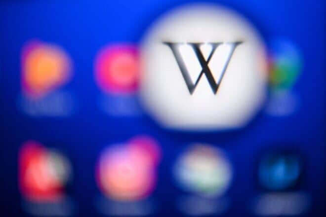The Wikipedia logo is seen on a tablet screen. Photo by Kirill Kudryavtzev/AFP via Getty Images.