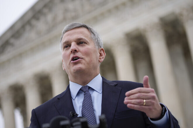 North Carolina Attorney General Josh Stein talks to reporters outside the U.S. Supreme Court after he attended oral arguments in the Moore v. Harper case Dec. 7, 2022 in Washington, D.C. Photo by Drew Angerer/Getty Images.