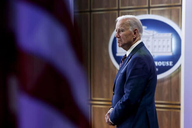 U.S. President Joe Biden listens as Mark Anthony Thomas, the President and CEO of the Greater Baltimore Committee and Baltimore Tech Hubs coalition, introduces him at an event at the South Court Auditorium in the Eisenhower Executive Office Building at the White House on Oct. 23, 2023 in Washington, D.C. Photo by Anna Moneymaker/Getty Images.