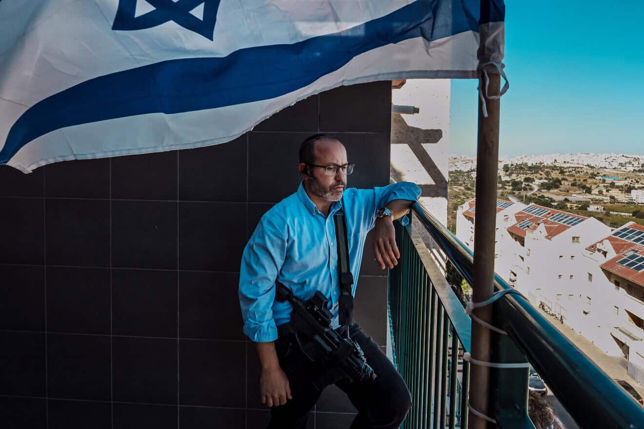 Tzvika Mor speaks during a telephone interview, at his home in Kiryat Arba, Nov. 9, 2023. Photo by Marcus Yam/Los Angeles Times via Getty Images.