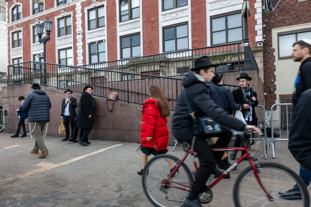 Hasidic men and boys outside of the Chabad-Lubavitch global headquarters in Crown Heights, Brooklyn on Jan. 12, 2024 in New York City. Photo by Spencer Platt/Getty Images.