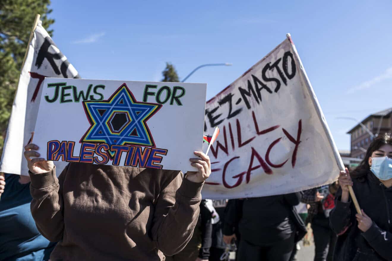 A student holds a placard reading "Jews for Palestine" during a pro-Palestine student protest at the University of Nevada in Reno, Nevada, on May 8, 2024. Photo by Kia Rastar/Middle East Images/AFP via Getty Images.