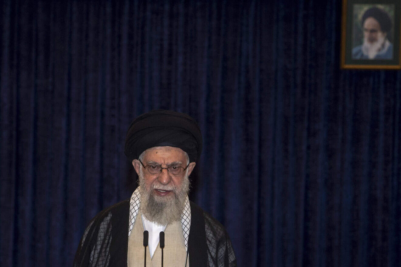 Iran's supreme leader Ayatollah Ali Khamenei addresses the media after casting of his ballot in the presidential runoff elections in Tehran on June 28, 2024. Photo by Majid Saeedi via Getty Images.