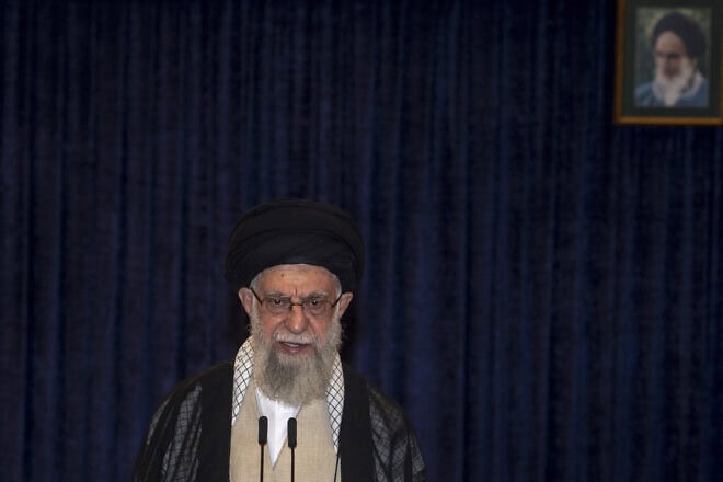 Iran's supreme leader Ayatollah Ali Khamenei addresses the media after casting of his ballot in the presidential runoff elections in Tehran on June 28, 2024. Photo by Majid Saeedi via Getty Images.