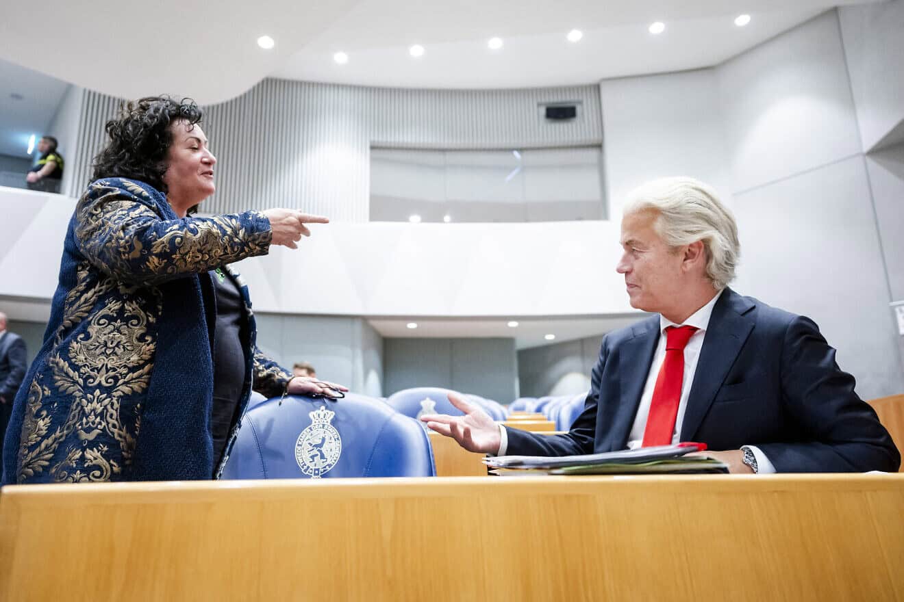 Freedom Party chief Geert Wilders speaks with Caroline van der Plas, the leader of the Farmer–Citizen Movement, at the House of Representatives in The Hague, Sept. 18, 2024. Photo by Sem van der Wal/ANP/AFP via Getty Images.